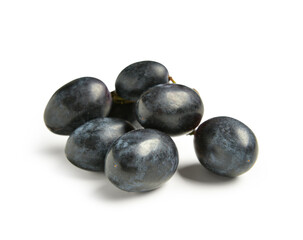 Sweet black grapes on white background