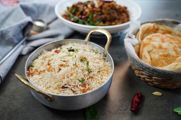 Kerala beef fry roast served with parotta and ghee rice - Malabar Iftar feast