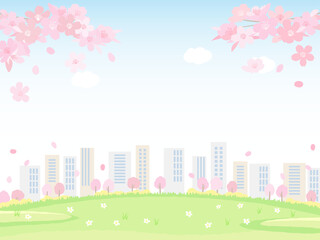 桜とオフィスと青空と芝生の背景　春の風景
