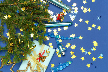 Sex toys with Christmas decor on blue background