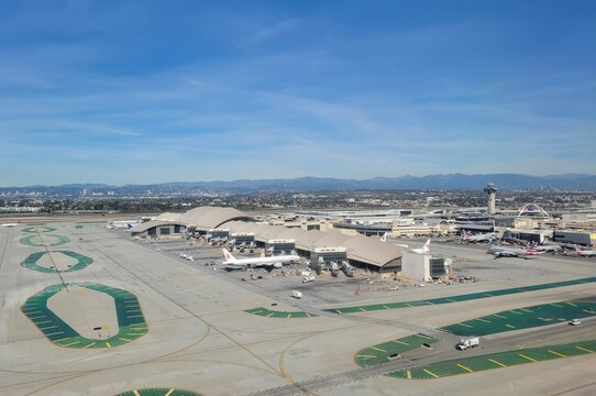 Aerial View of Aircraft, ATC Tower, and Tom Bradley International Terminal at Los Angeles International Airport (LAX) - Los Angeles, California, USA	