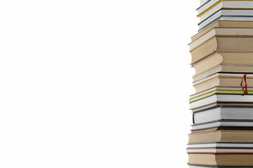 Stack of many different books isolated on white