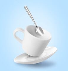 Spoon, cup and saucer falling on light blue background