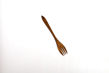 wooden fork isolated on white background