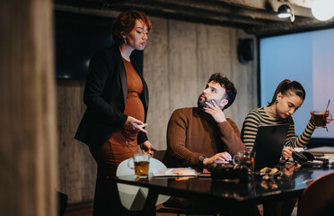 Late night at the corporate office, business team analyzing sales stats, planning project budgeting for growth. Executives collaborating, sharing ideas for market expansion.