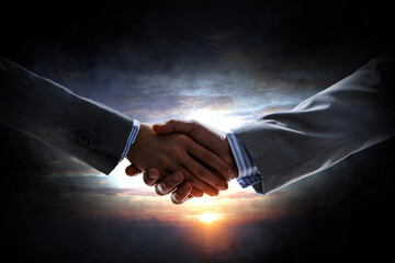 Partnership concept. Image of handshake - 737651399