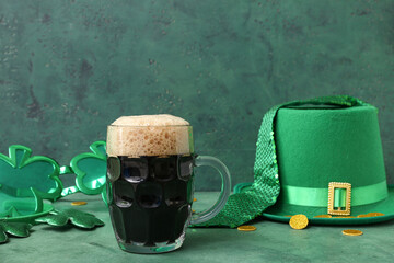 Mug of dark beer with leprechaun hat, tie and plastic eyeglasses for St. Patrick's Day celebration...