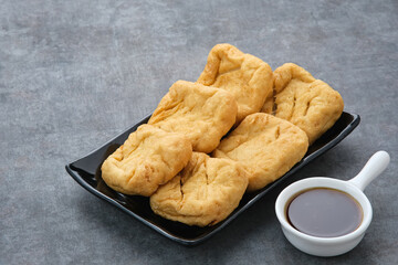 Tahu Goreng or Fried Tofu, Indonesia traditional food, made from fermented soybean extract.
