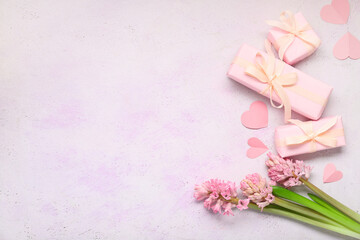 Composition with hyacinths and presents on light background