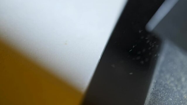 The machine separates out spoiled coffee beans using sensors.