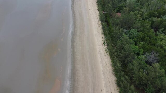 View of a quiet beach, with a beautiful stretch of sand in Pagatan