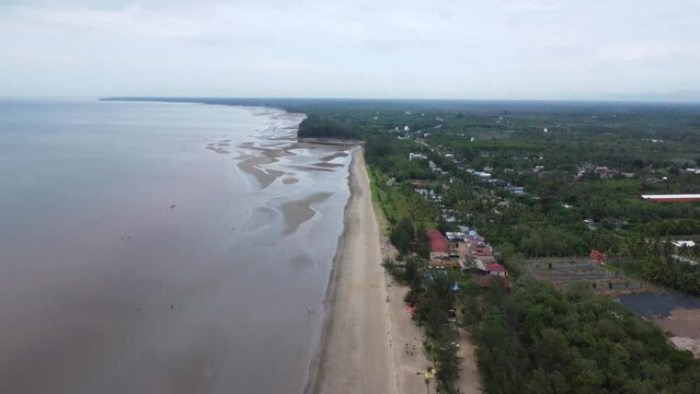 View of a quiet beach, with a beautiful stretch of sand in Pagatan