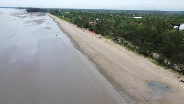 View of a quiet beach, with a beautiful stretch of sand in Pagatan