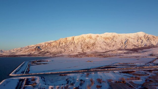 4k Aerial Drone Snow-Capped Mountains Overlooking Willard Bay, Utah