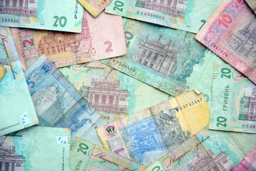 Processed collage of Ukrainian Hryvnia UAH bills banknotes texture. Background for banner