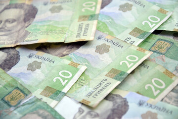 Processed collage of Ukrainian Hryvnia UAH bills banknotes texture. Background for banner