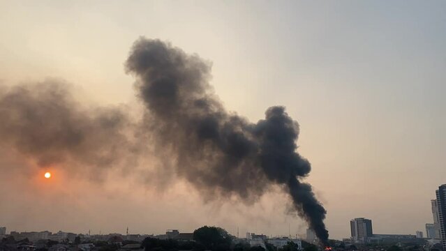 Big City air pollution, black smoke on sky, toxic chemical smog, worst air quality