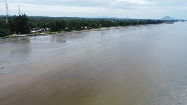 View of a quiet beach, with a beautiful stretch of sand in Pagatan