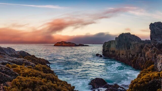 Rocky Shore on West Coast of Pacific Ocean in Tofino on Vancouver Island, BC, Canada. Sunset Sky. Cinemagraph Continuous Loop Animation