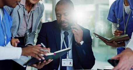Busy, phone call and man with medical paperwork for signature, health communication and help from doctor. Chaos, nurse and healthcare consultant with anxiety and stress from overwork at a clinic