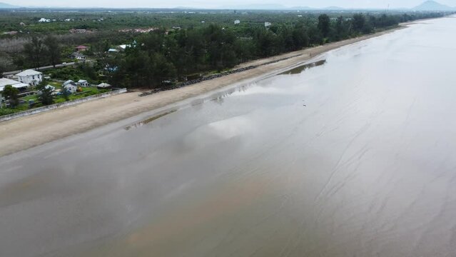 View of a quiet beach, with a beautiful stretch of sand in Pagatan