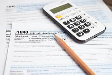Naklejka premium Tax form 1040 U.S. Individual Income Tax Return, business finance concept.