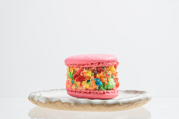 A french sweet delicacy, macaroons variety closeup.macaroon colourful on white background.