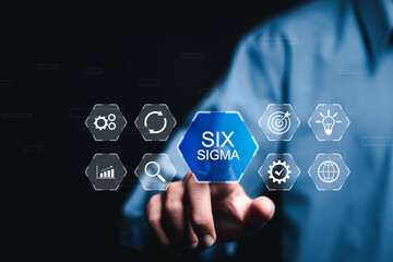 Six Sigma concept. Person touch six sigma word on virtual screen for manufacturing, quality control...