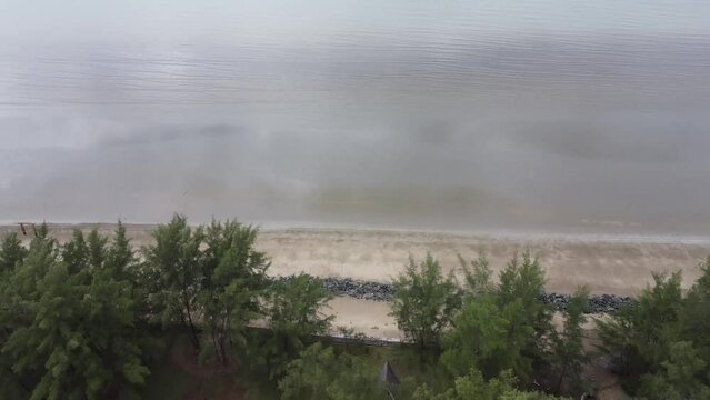 View of a quiet beach, with a beautiful stretch of sand in Pagatan