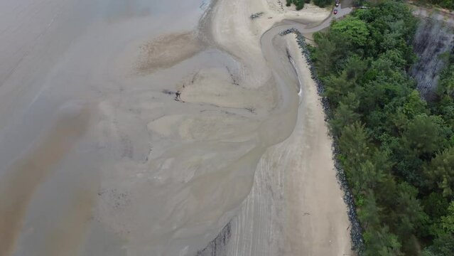 View of a quiet beach, with a beautiful stretch of sand in Pagatan