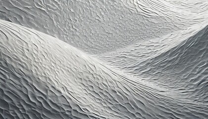 A close-up view of a textured surface with complex, flowing patterns that resemble waves or ripples.