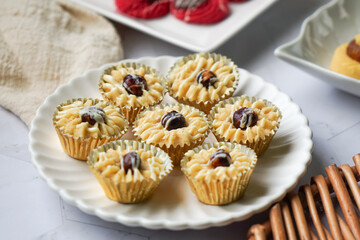 Popular cookies in Malaysia during celebration of Eid Mubarak (Hari Raya) on white background and selective focus.