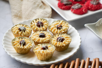 Popular cookies in Malaysia during celebration of Eid Mubarak (Hari Raya) on white background and selective focus.