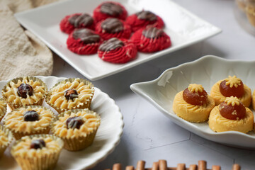 Popular cookies in Malaysia during celebration of Eid Mubarak (Hari Raya) on white background and selective focus.