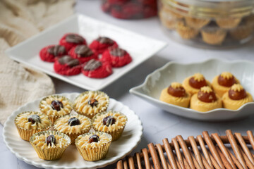 Popular cookies in Malaysia during celebration of Eid Mubarak (Hari Raya) on white background and selective focus.