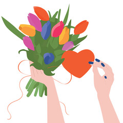 bouquet in hand tulips, spring flowers. Heart in hand