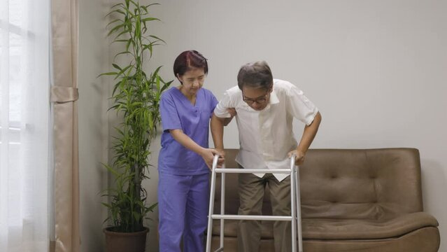 Caregiver takecare older man that having Sarcopenia or muscle loss. Sarcopenia is a degenerative disease of the muscle usually caused by the natural consequence of aging.