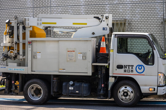 Tokyo, Japan, 3 November 2023: NTT utility vehicle parked on the street.