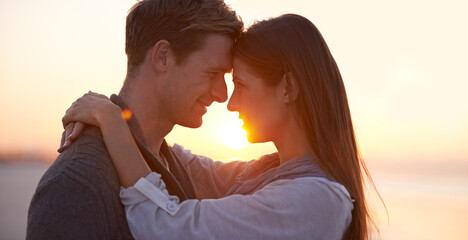 Couple, forehead touch on beach and sunset, nature and travel with bonding for love and commitment...