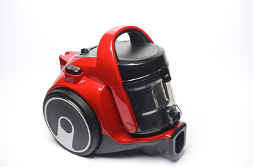 Red modern vacuum cleaner on a white background
