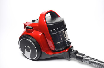 Red modern vacuum cleaner on a white background - obrazy, fototapety, plakaty