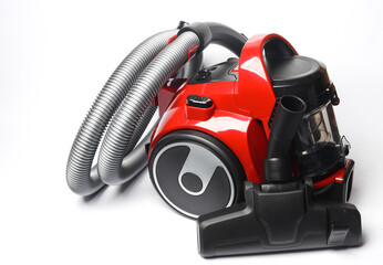 Fototapeta premium Red modern vacuum cleaner on a white background