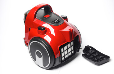 Filter of modern vacuum cleaner on white background