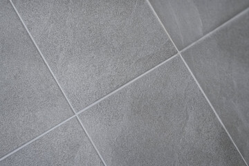 The square rough gray tile is so stylish and classic