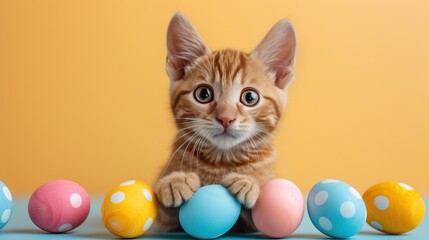 Fototapeta na wymiar Red cat holds colorful Easter eggs on a deep yellow background, concept of Easter holiday, good mood