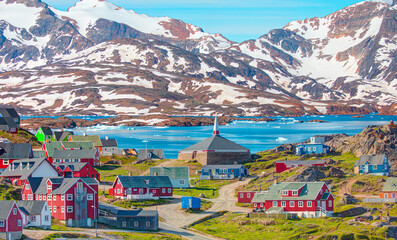 Picturesque village on coast of Greenland - Colorful houses in Tasiilaq, East Greenland