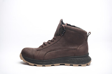 Brown leather boot on white background