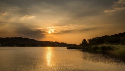 Fototapeta na wymiar sunset over the river wallpaper pier jetty golden hour sunset on lake, trees in background landscape
