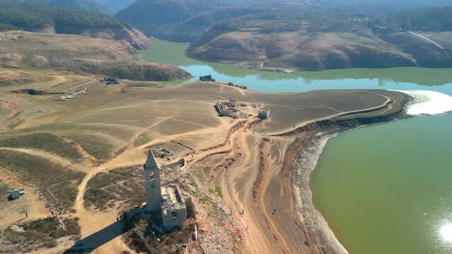Sau swamp dike in Catalonia, Spain, intense drought in 2024 church that is normally under water, due to the drought it looks complete