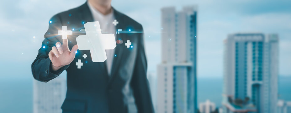 plus sign icon floating in the air on hand It symbolizes the introduction of positive elements such as personal development, social profit, health insurance and a growth mindset.